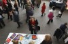 A job seeker talks to an exhibitor at the Colorado Hospital Association health care career fair in Denver