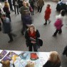 A job seeker talks to an exhibitor at the Colorado Hospital Association health care career fair in Denver