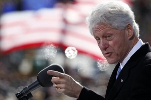 Former U.S. President Bill Clinton speaks to a crowd at a campaign event in New Hampshire